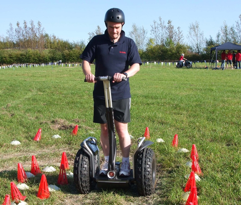 Outdoor Segway team building challenge on grass course