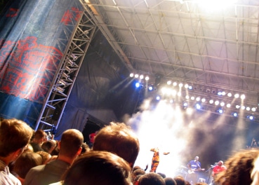 Crowd watching live band on stage
